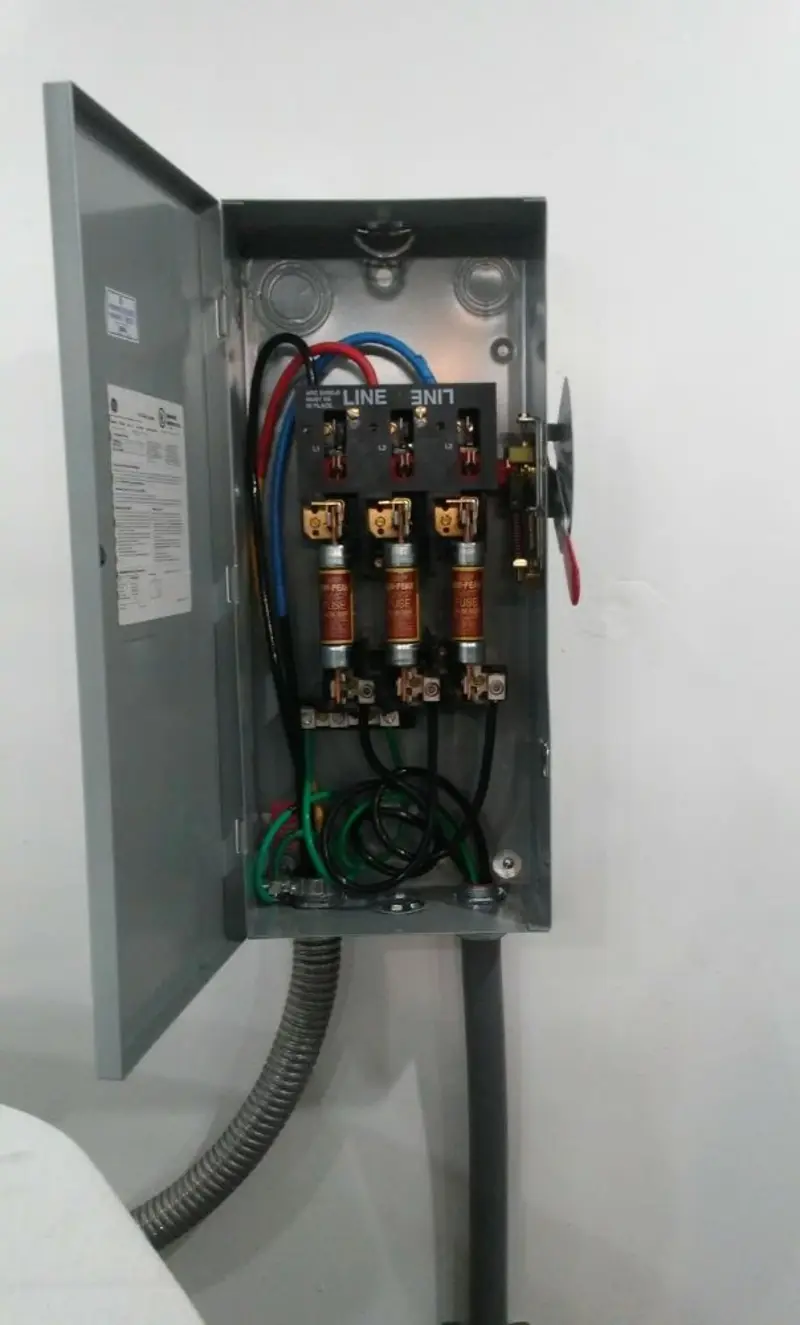 Three-phase disconnect switch installed for Smoke Detector Installation in St. Johns